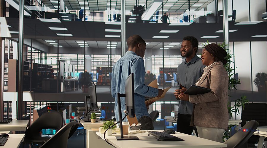 African American team collaborates on a financial planning project in a business space, emphasizing teamwork and data analysis to make informed decisions for future firm growth. Camera B.