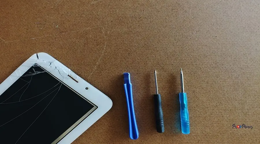 Mobile phone on the desk of a mobile phone repairman Mobile phone on the desk of a mobile phone repairman