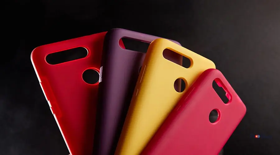 colorful cases for modern smartphones stand on stands on the tab colorful cases for modern smartphones stand on stands on the table one object in focus blurred background