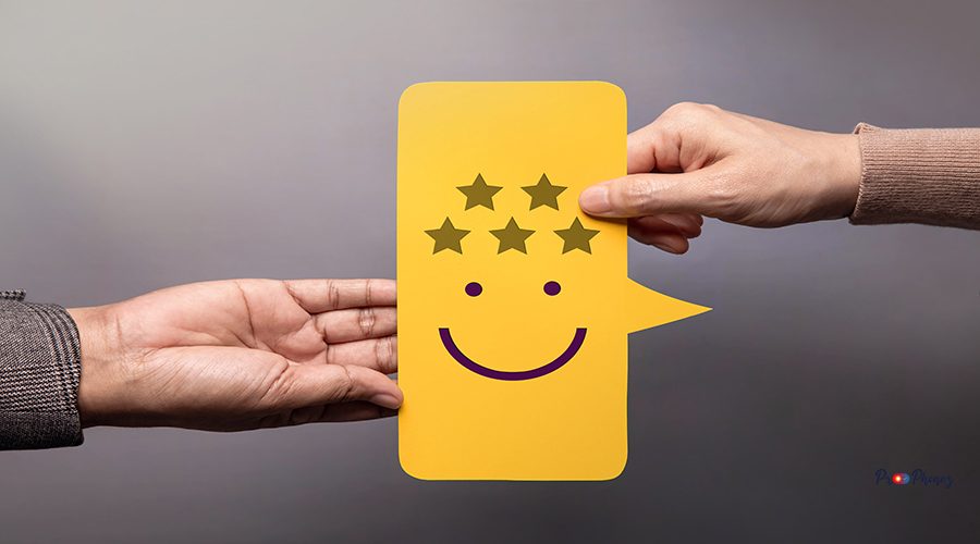 Customer Experience Concept. Happy Client giving a Five Star Rating and Smiling Face Feedback on Bubble Speech Card to a Businessman. Positive Review. Satisfaction Survey. High Best Excellent Score