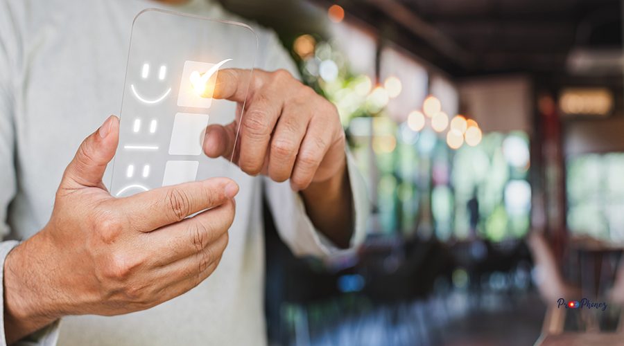 customer man people use finger is pointing a virtual screen on happy smiley face icon symbol to give satisfaction in service. Satisfaction survey, and Customer service concept. rating very impressed.