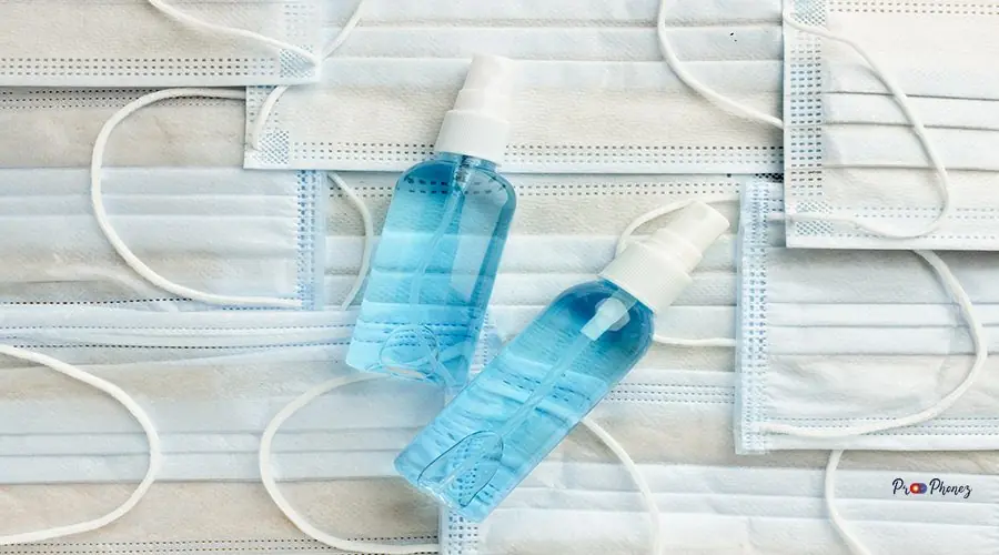 flat-lay-hand-sanitizer-bottles-medical-masks flat-lay-hand-sanitizer-bottles-medical-masks
