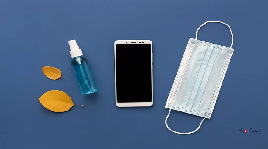 flat-lay-medical-mask-with-smartphone-hand-sanitizer flat-lay-medical-mask-with-smartphone-hand-sanitizer
