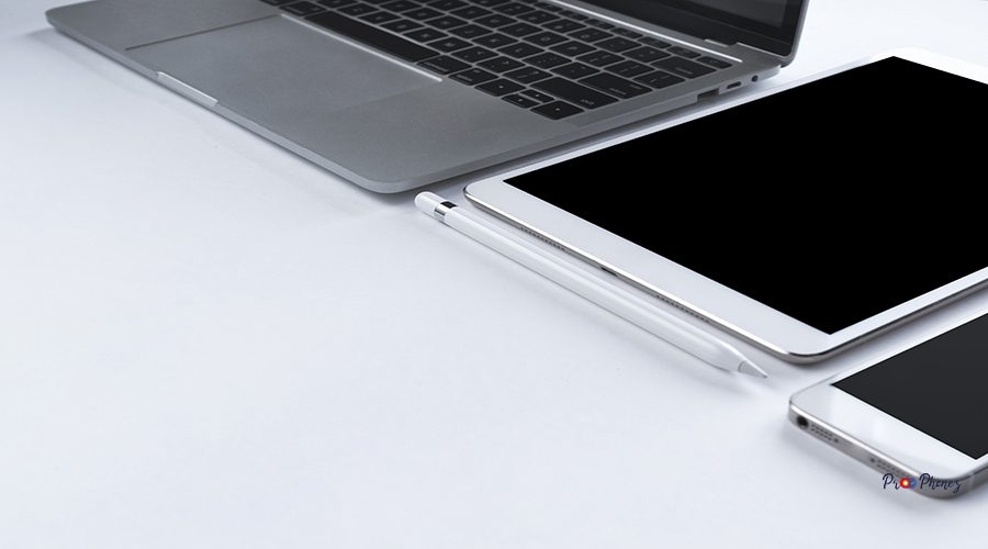 grey-laptop-with-electronic-gadgets