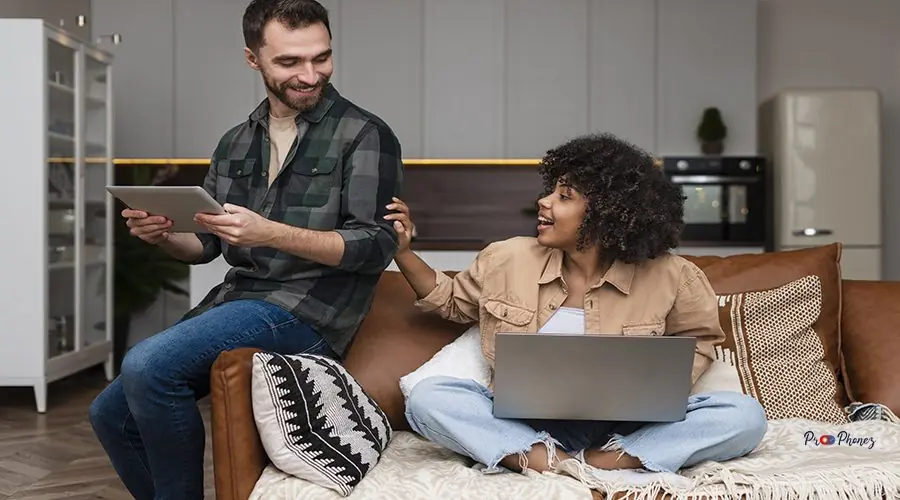 happy-woman-sitting-sofa-looking-her-boyfriend happy-woman-sitting-sofa-looking-her-boyfriend