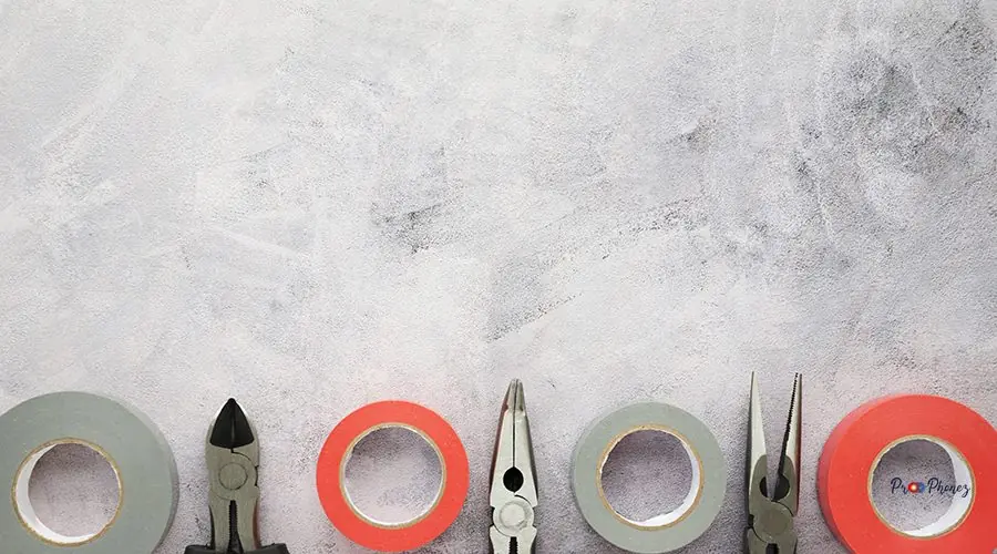 insulating-tape-plier-arranged-row-white-cement-concrete-floor insulating-tape-plier-arranged-row-white-cement-concrete-floor