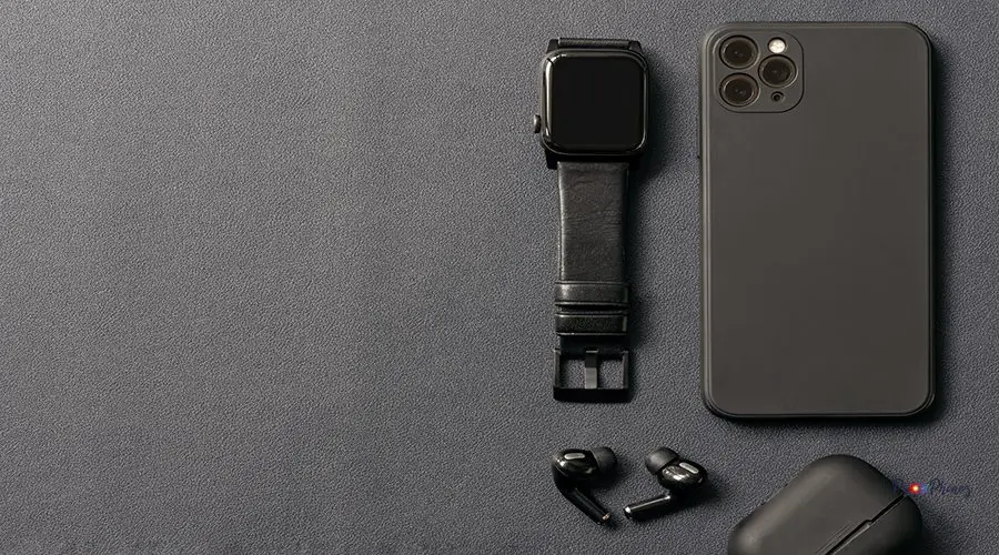 Top view back side iphne 11 pro max, apple watch sesies 6 and ai Chiangmai, Thailand,April, 24, 2021: New Iphone 11 Pro Max, Apple Watch Series 6 and Airpod Pro on black leather background.