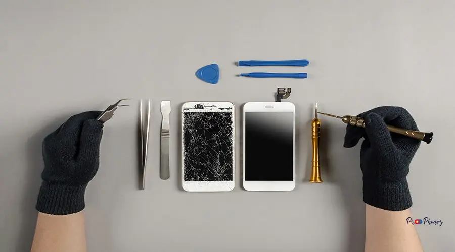 Technician repairing broken smartphone on desk Technician prepairing to repair and replace new screen broken and cracked screen smartphone prepairing on desk