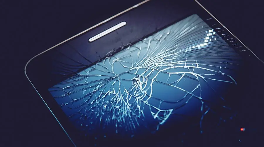 Damaged Smartphone Display Damaged Smartphone Display. Cracked Screen Glass
